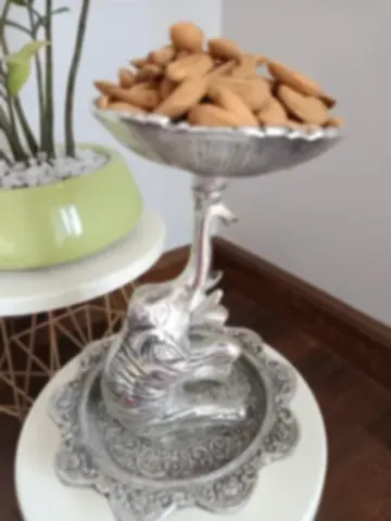 A dry-fruit tazza carried on the back of a silver-plated elephant