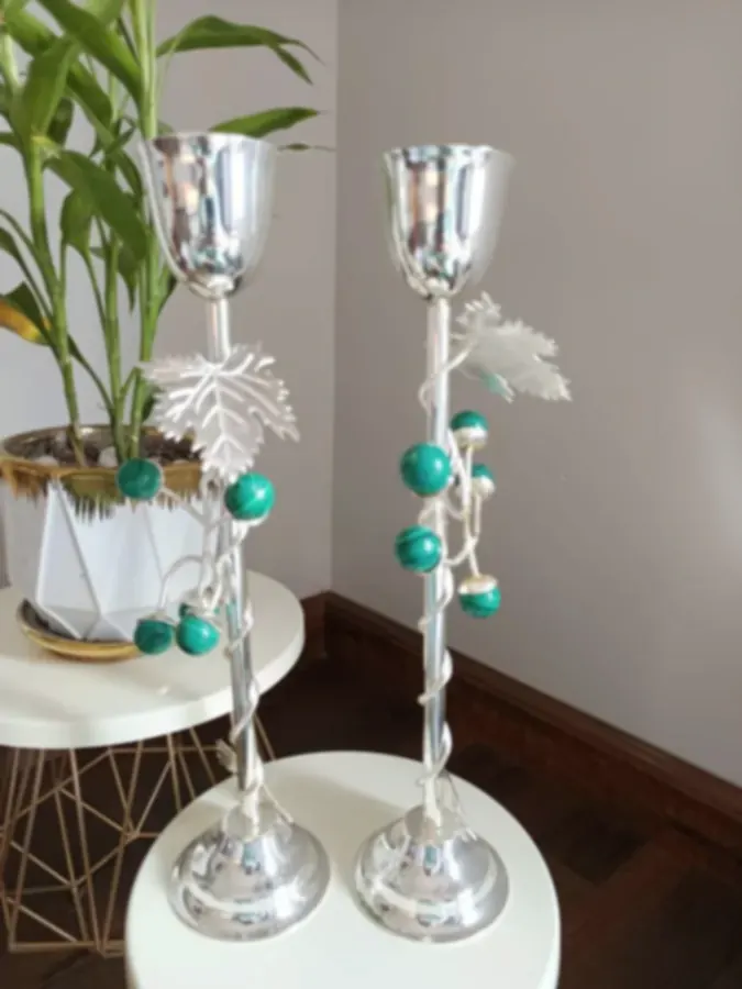 Slim silver goblet candle stands wound with vines and green malachite beads